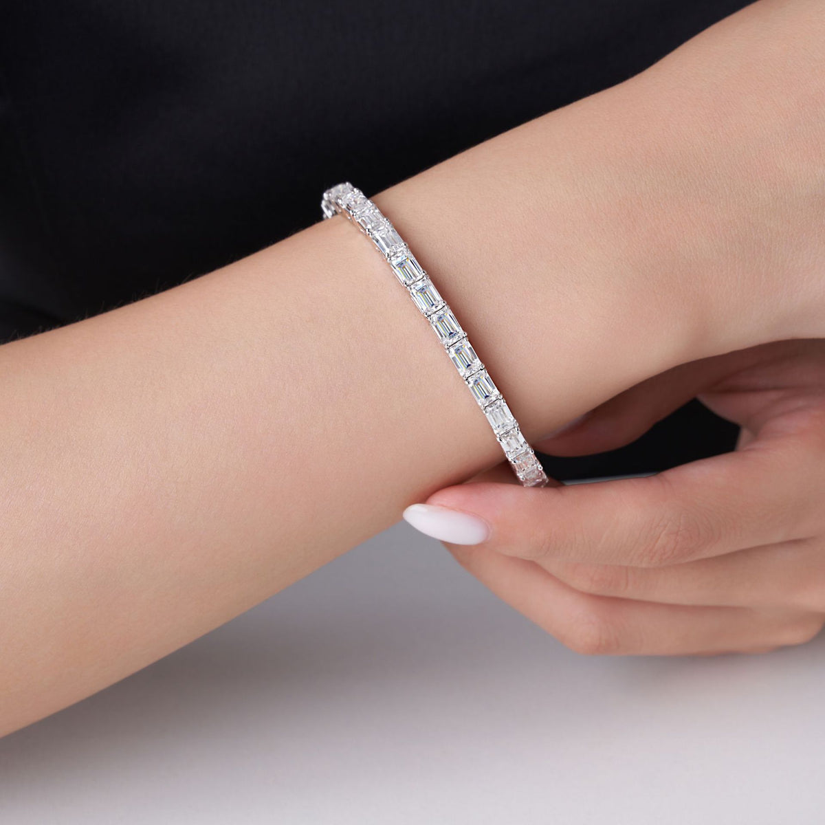 Couple's silver-encrusted moissanite bracelet